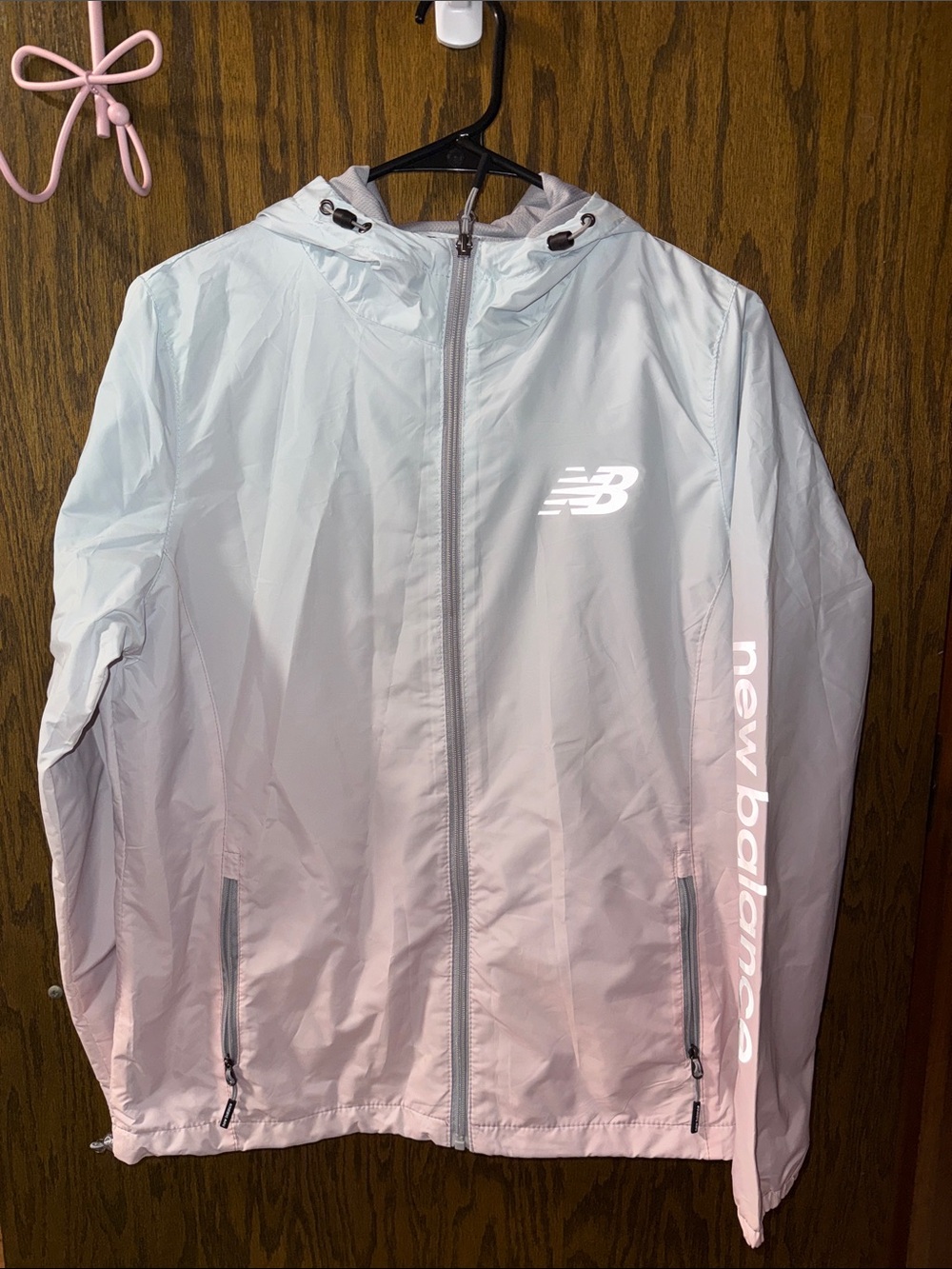 Women's lightweight hooded jacket - likely a windbreaker